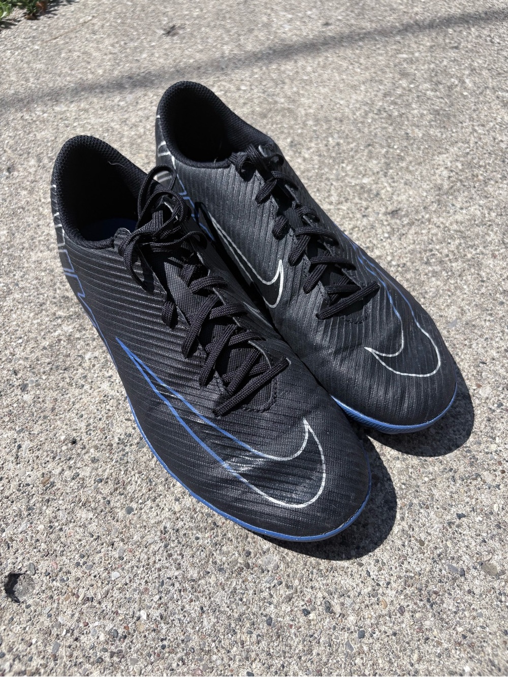 Nike Men’s Black Athletic Soccer Cleats with Blue and White Accents